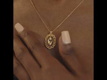 Load and play video in Gallery viewer, Oval rose necklace, flower coin necklace, oval flower pendant, suspended, dangling, tulip necklace, oval pendant, scalloped edge, floral